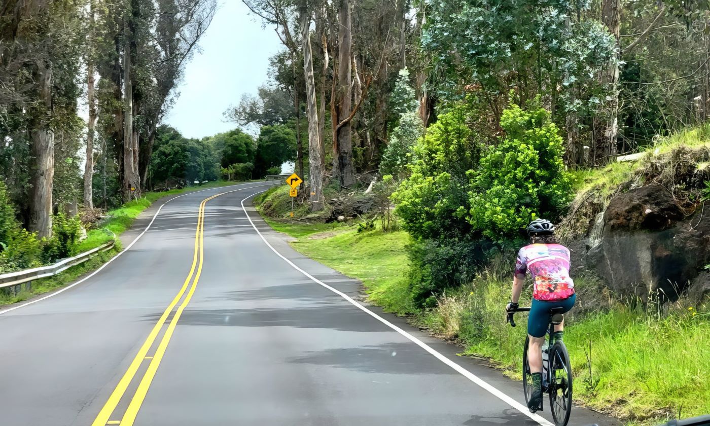 Cyclist on the road up to Haleakala on Maui