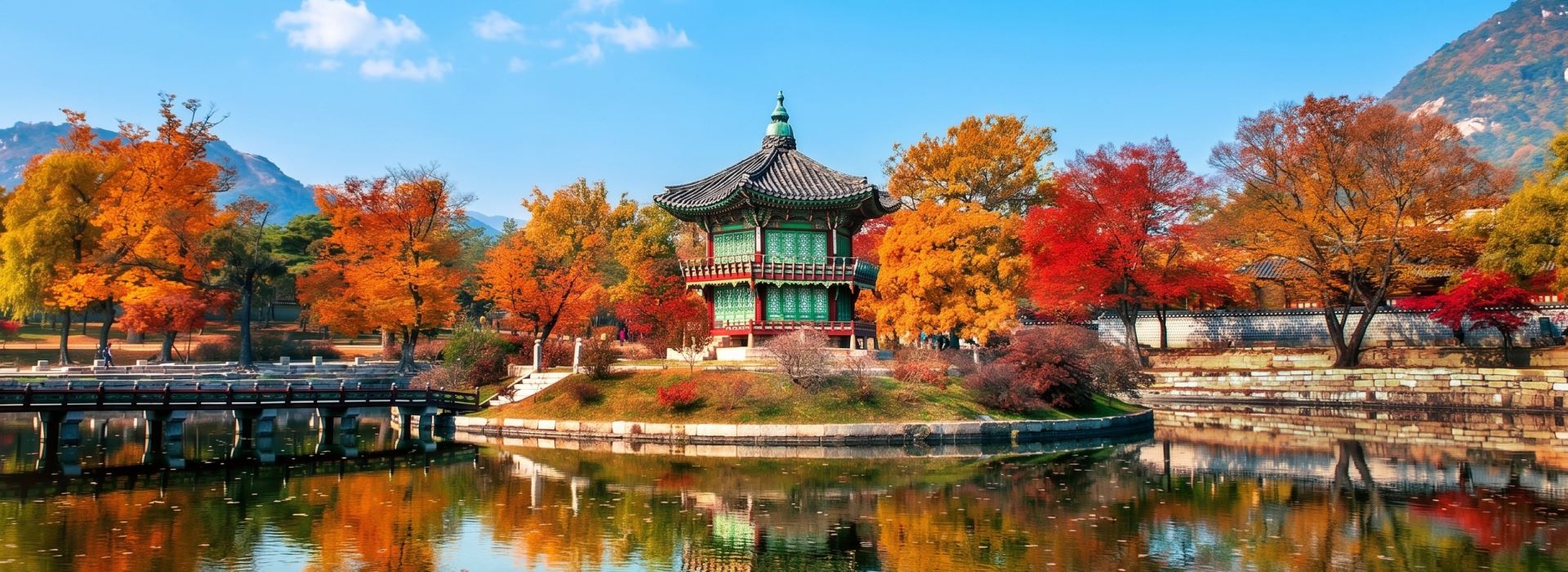 Gyeongbokgung Palace pavilion reflected in the pond, Seoul, in autumn